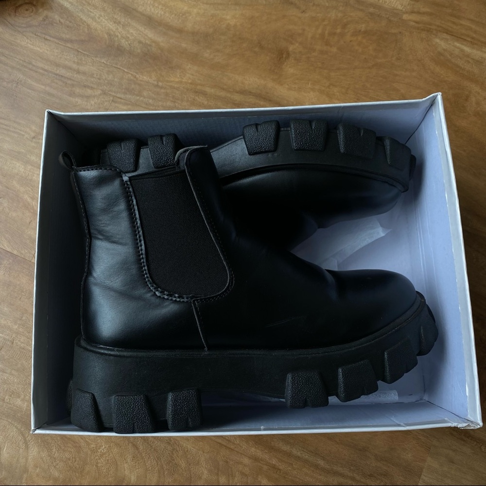 Black high top boots